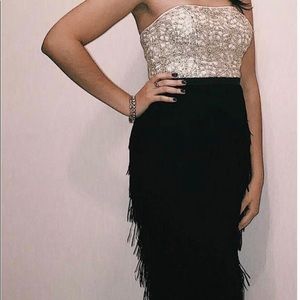 Brand: Nicole Miller Size:6 Color: black and gold